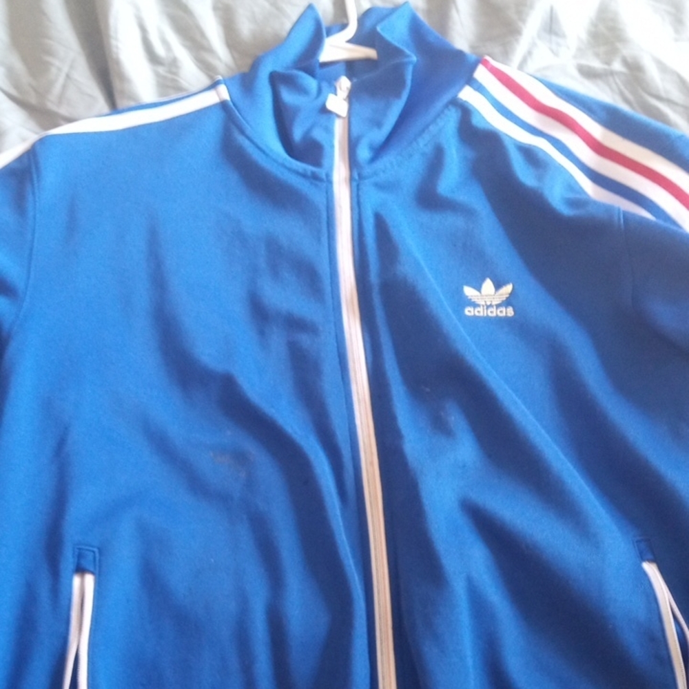 adidas Blue Track Jacket with White Zipper and Red-Accented Shoulder Stripes